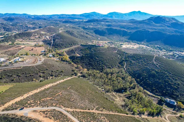 a view of a mountain with a lake
