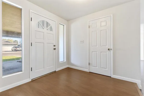 an empty room with sliding door