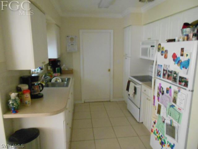 1424 Mandel Road Fort Myers, FL 33919 - Photo 6 of 15 a room with a baby toys