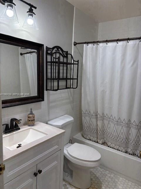 19420 Southwest 307th Street Homestead, FL 33030 - Photo 14 of 17 a bathroom with a sink a toilet and shower curtain