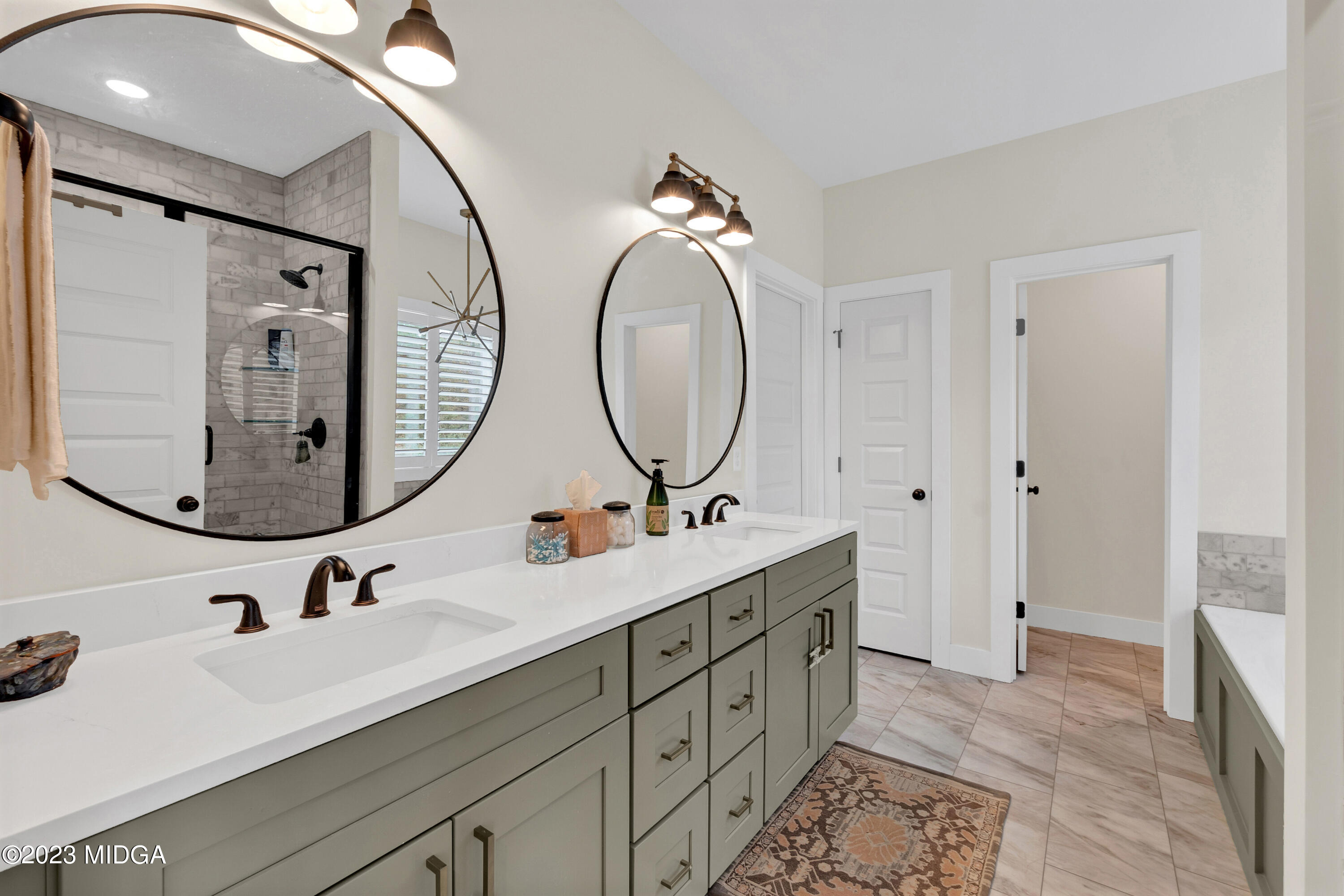 7370 Thomaston Road Macon, GA 31220 - Photo 50 of 81 a bathroom with a double vanity sink mirror and a mirror