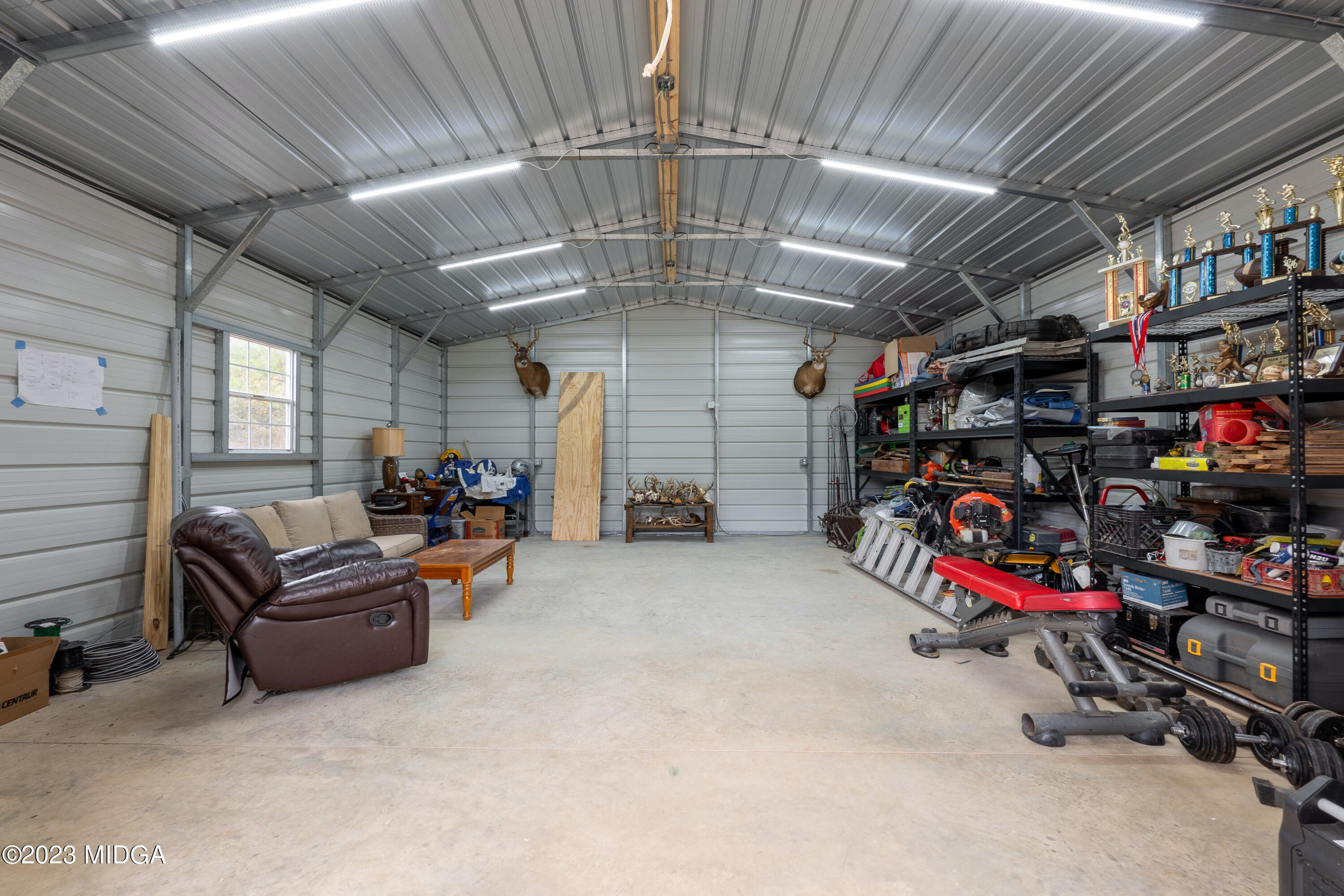 7370 Thomaston Road Macon, GA 31220 - Photo 65 of 81 a view of a garage with storage