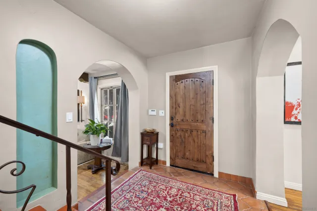 a view of hall way with mirror