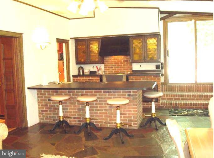 2131 Edgewater Parkway Silver Spring, MD 20903 - Photo 9 of 26 Solarium with Cook top / We tbar/Fridge