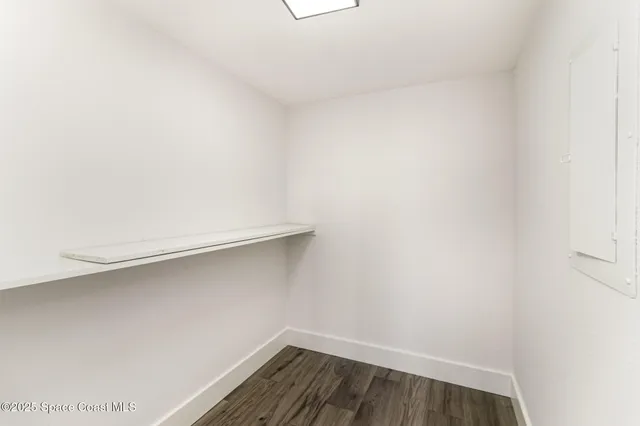 a view of small space with racks on the wall