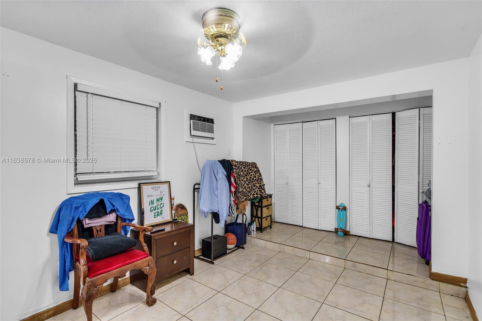 2761 Southwest 33rd Court Miami, FL 33133 - Photo 13 of 46 a living room with furniture and a lamp