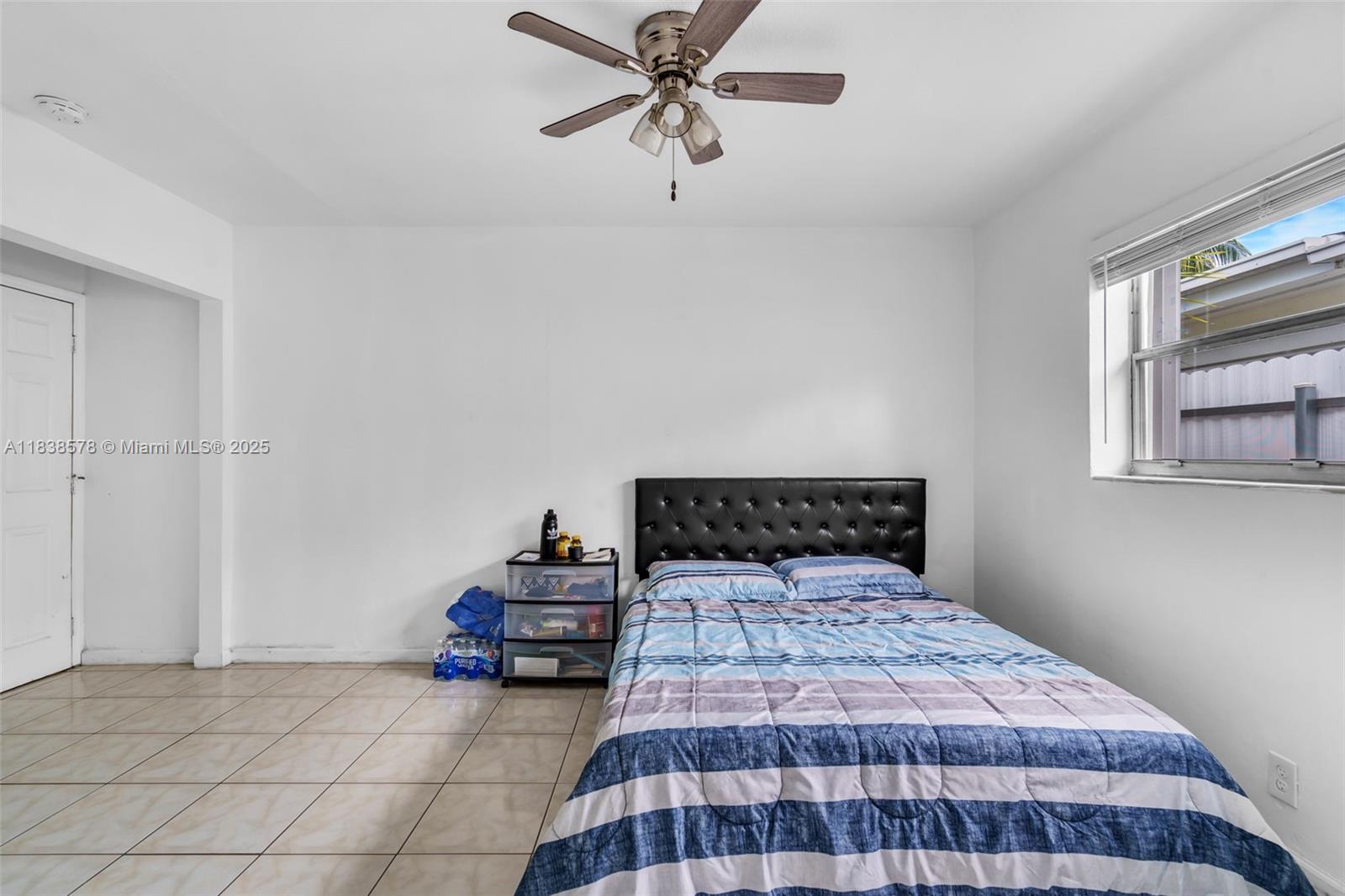 2761 Southwest 33rd Court Miami, FL 33133 - Photo 27 of 46 a bedroom with a bed and dresser