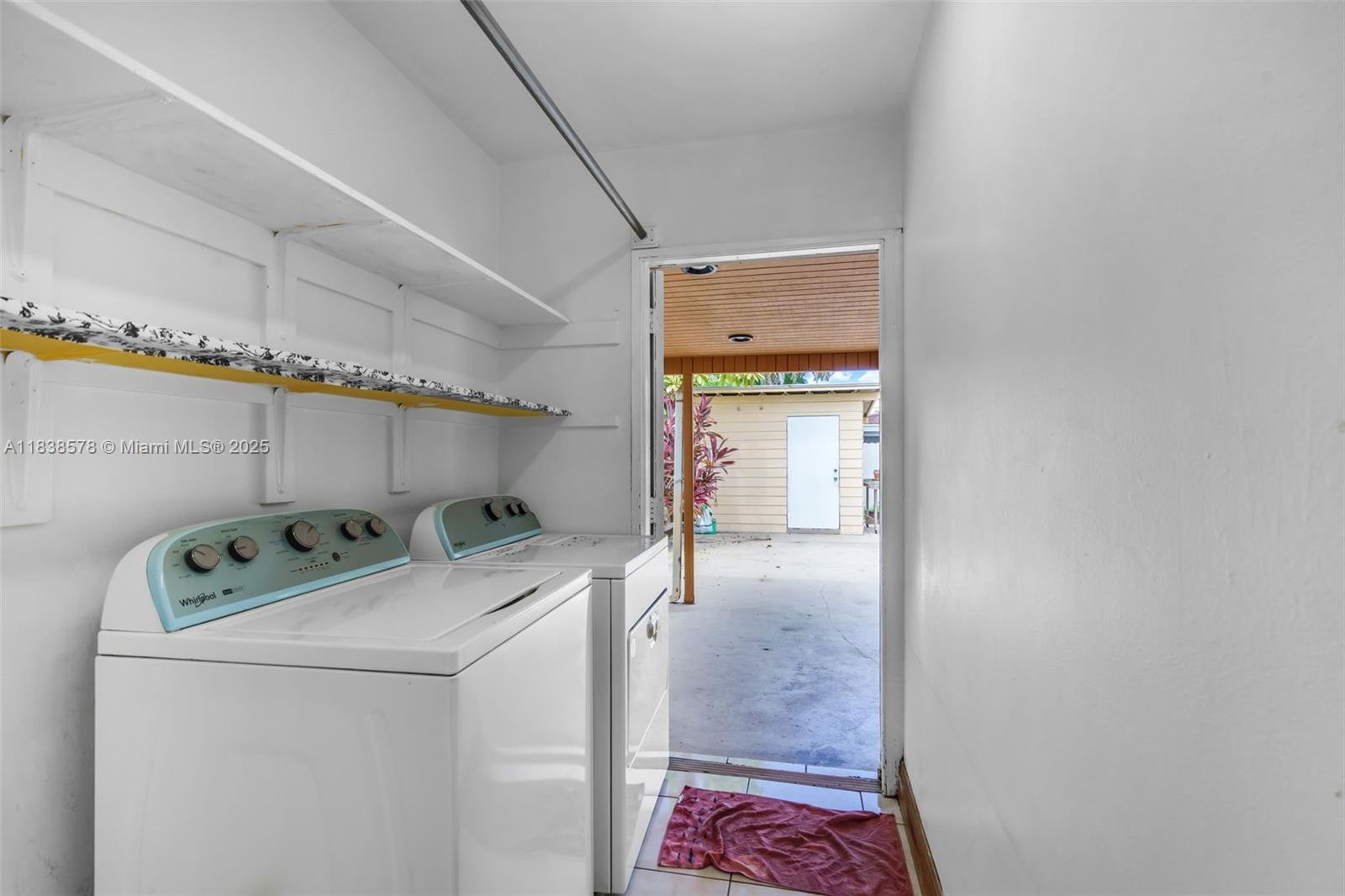 2761 Southwest 33rd Court Miami, FL 33133 - Photo 30 of 46 a utility room with dryer and washer