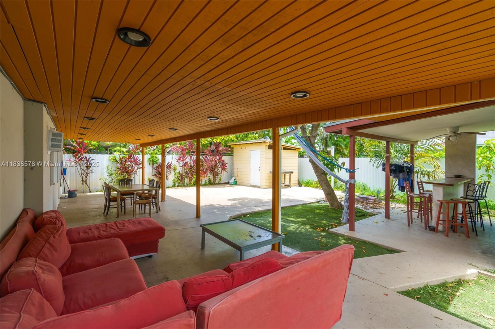 2761 Southwest 33rd Court Miami, FL 33133 - Photo 32 of 46 a outdoor living space with furniture and garden view