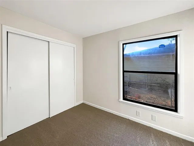 a view of an empty room with window