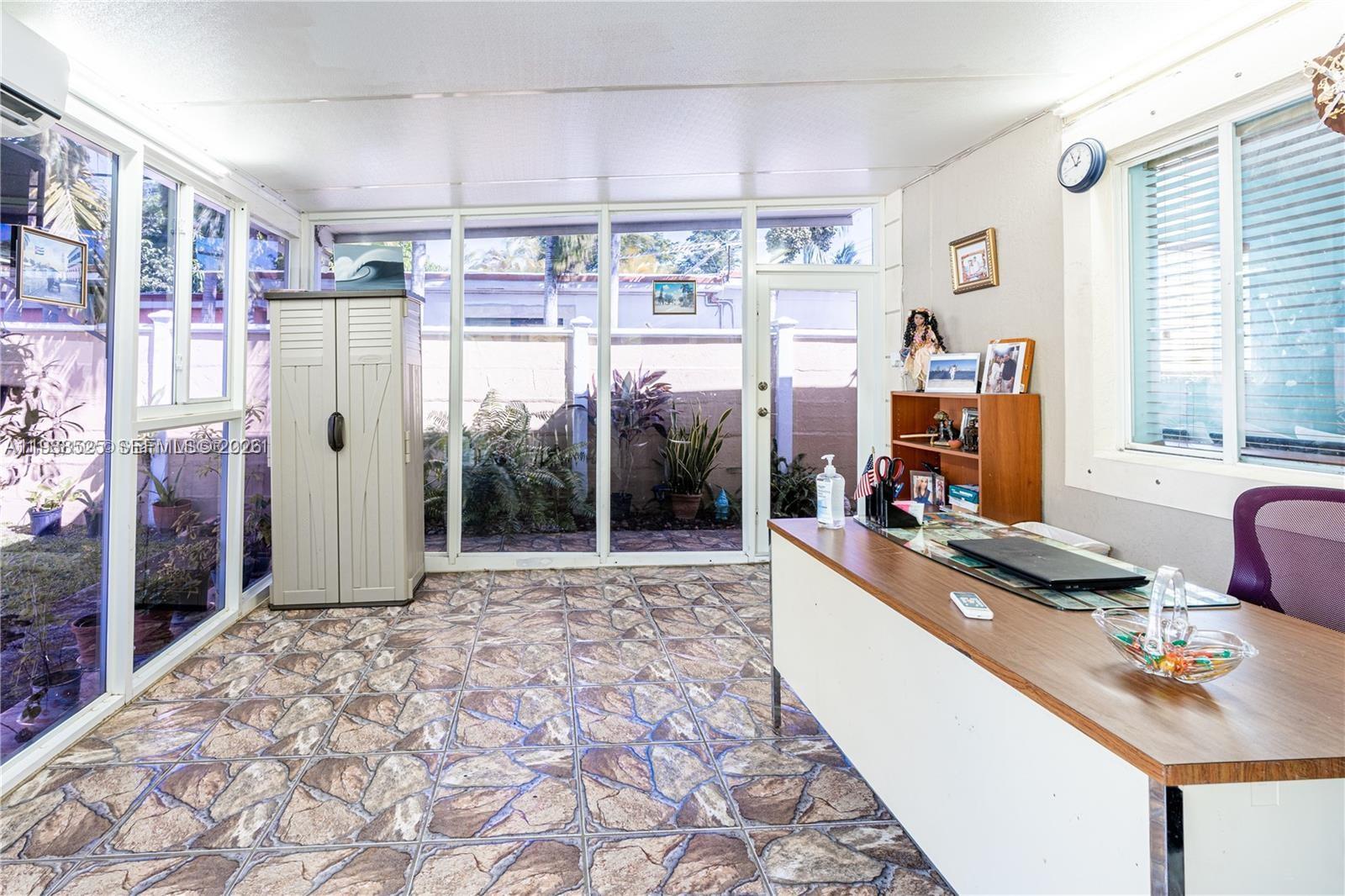 6181 Southwest 20th Street West Miami, FL 33155 - Photo 5 of 10 a room with musical instruments