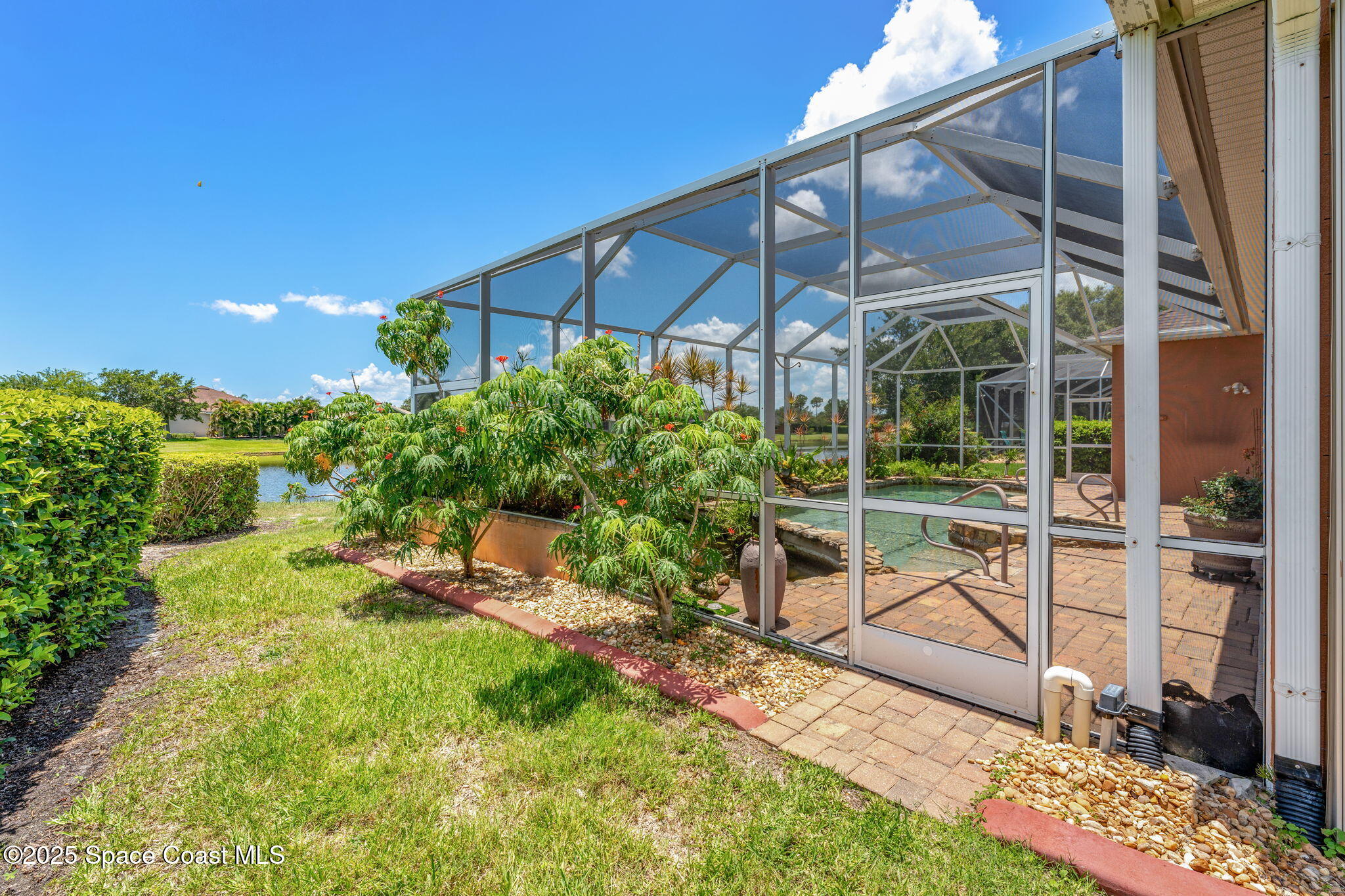 3121 Camberly Circle Melbourne, FL 32940 - Photo 33 of 52 a view of a chair and table in backyard