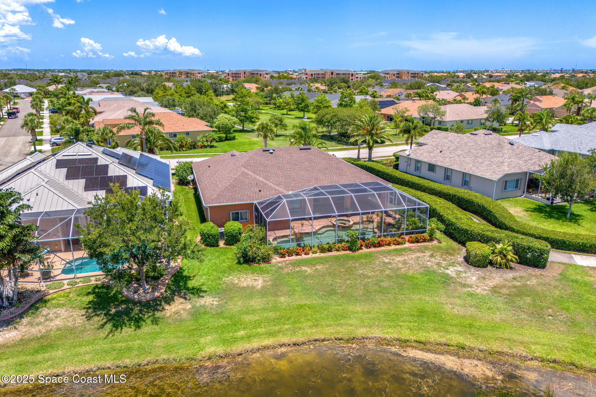 3121 Camberly Circle Melbourne, FL 32940 - Photo 37 of 52 an aerial view of residential houses with outdoor space and trees