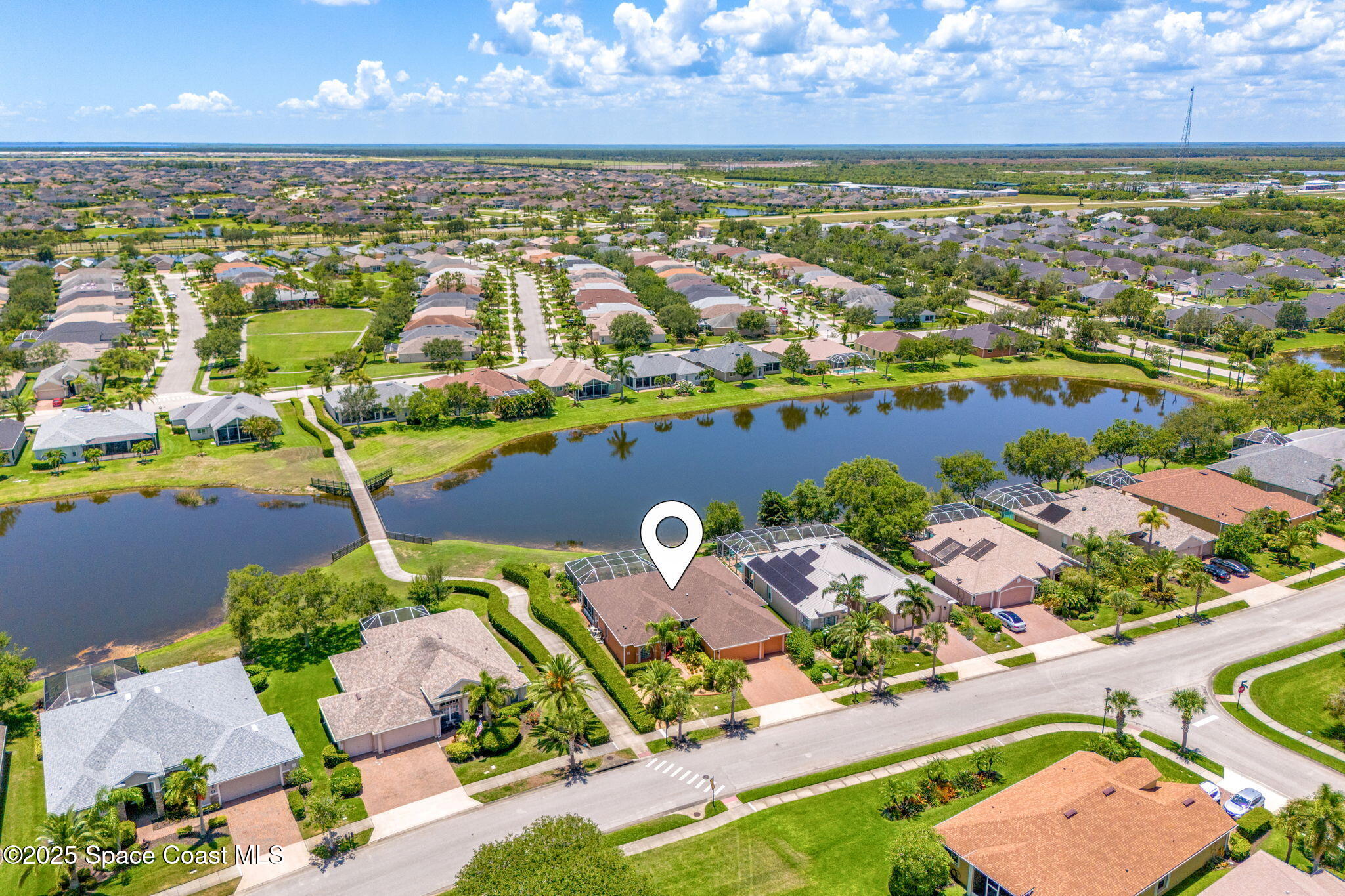 3121 Camberly Circle Melbourne, FL 32940 - Photo 40 of 52 an aerial view of residential houses with outdoor space