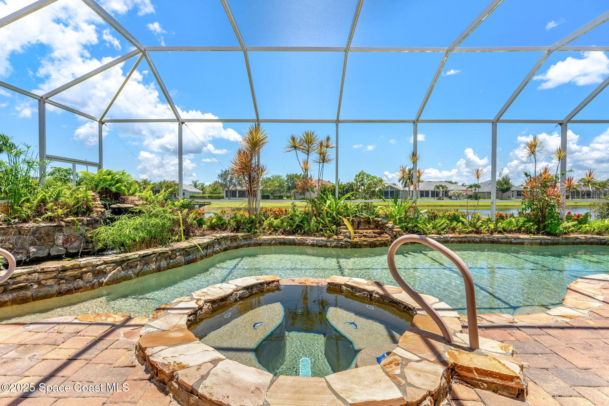 3121 Camberly Circle Melbourne, FL 32940 - Photo 4 of 52 a view of a swimming pool and a back yard