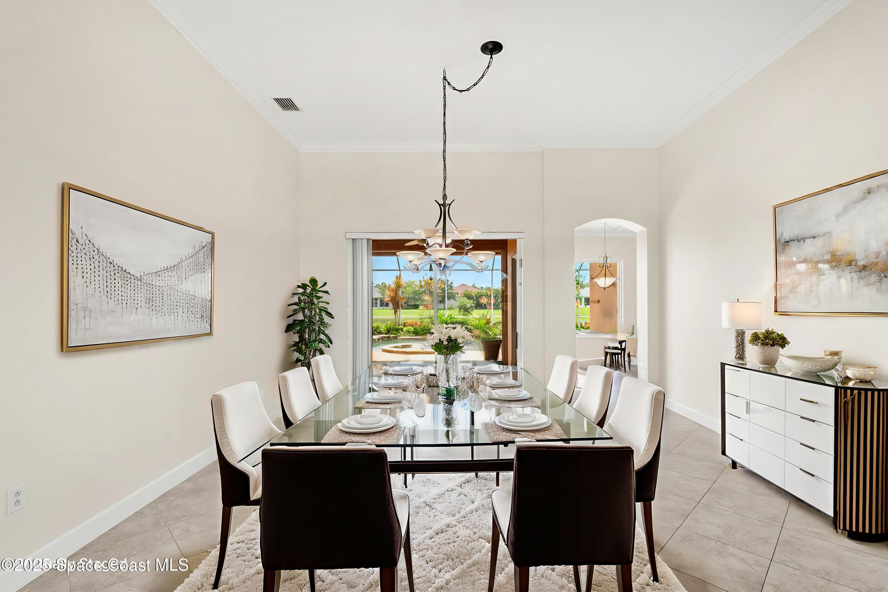 3121 Camberly Circle Melbourne, FL 32940 - Photo 10 of 52 a dining room with furniture and window
