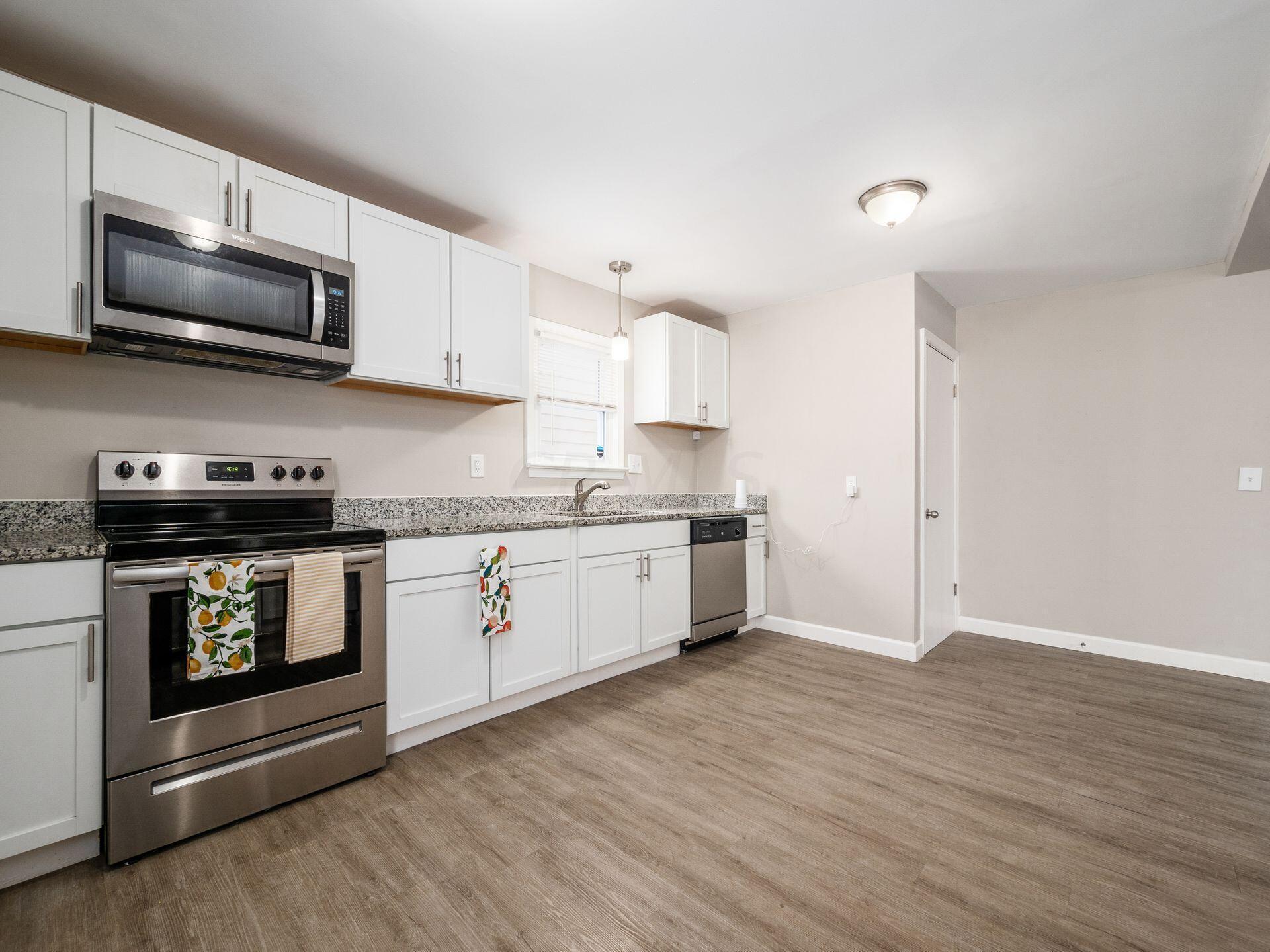 1118 Berkeley Road Columbus, OH 43206 - Photo 9 of 34 Granit top counters make food prep easy