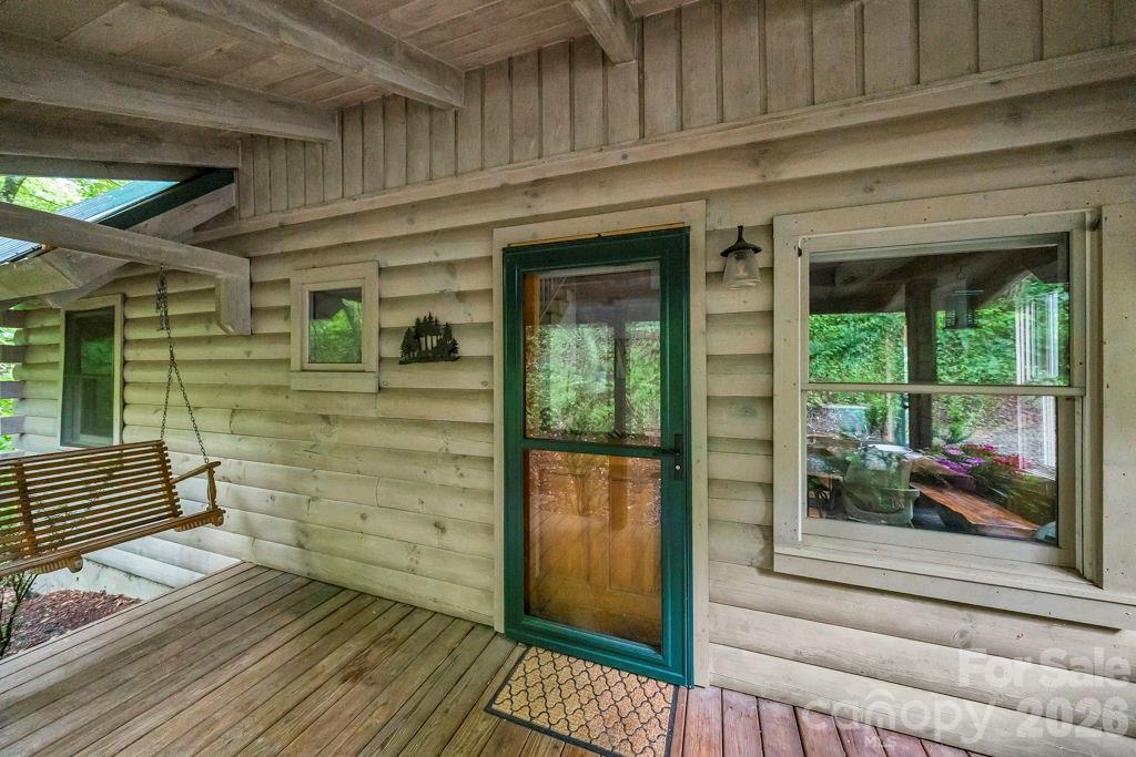 192 Dewitt Barnett Road, Unit 2 Vilas, NC 28692 - Photo 4 of 32 a view of front door of house with wooden floor