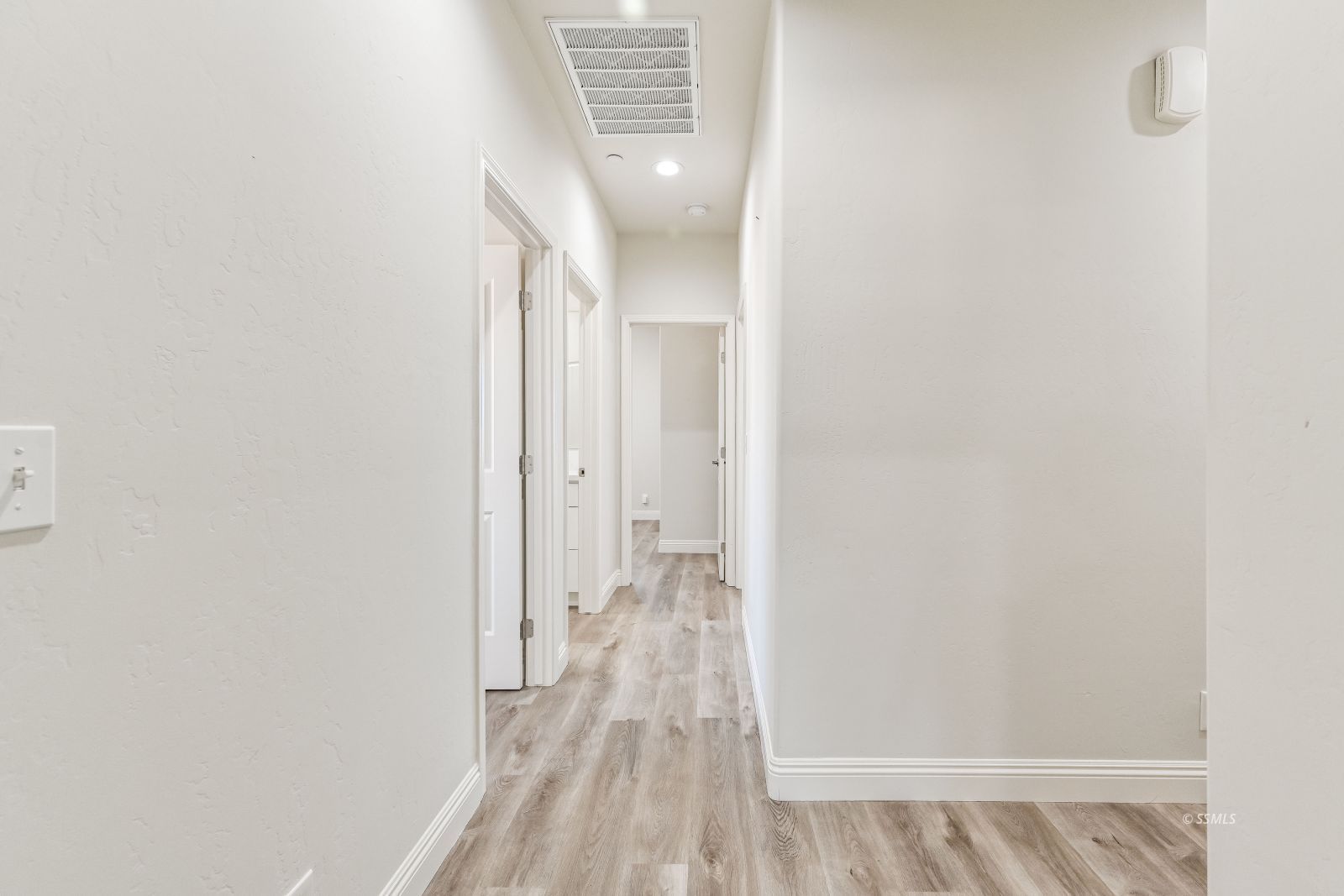 1031 West Church Avenue Ridgecrest, CA 93555 - Photo 42 of 49 a view of a room with wooden floor