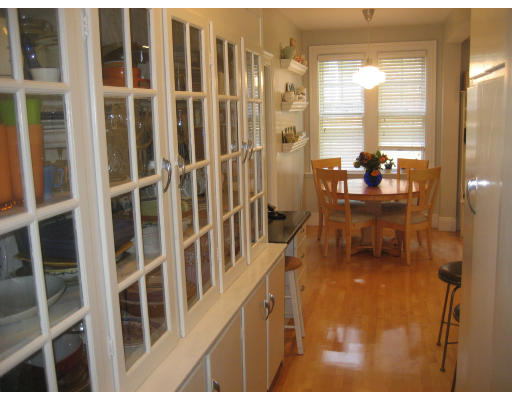 131 Gardner Road, Unit 1 Brookline, MA 02445 - Photo 8 of 10 a balcony with table and chairs