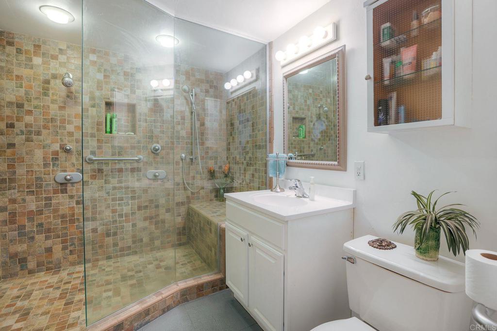 22223 Crestline Road Palomar Mountain, CA 92060 - Photo 39 of 90 a bathroom with a sink a toilet and shower