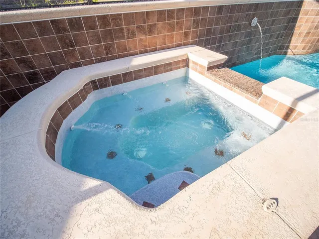 a view of a bathtub in a bathroom