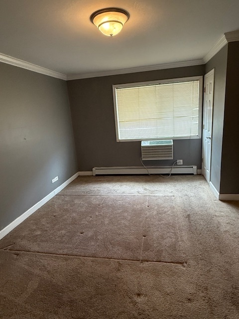 2234 South Goebbert Road, Unit 122 Arlington Heights, IL 60005 - Photo 22 of 29 an empty room with windows
