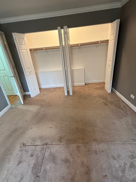 2234 South Goebbert Road, Unit 122 Arlington Heights, IL 60005 - Photo 24 of 29 a view of an empty room with a window