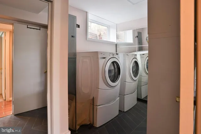 a utility room with dryer and washer
