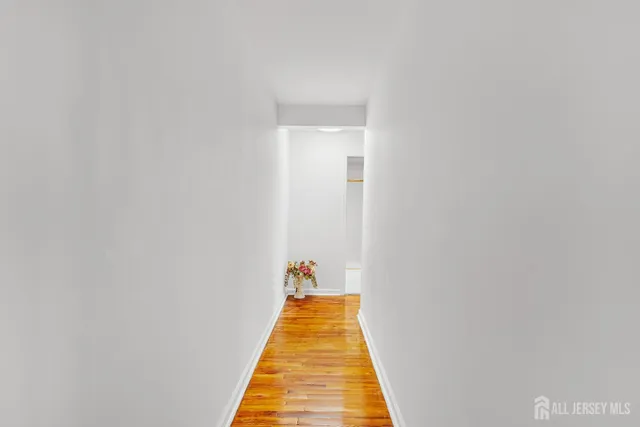 a hallway with a white door