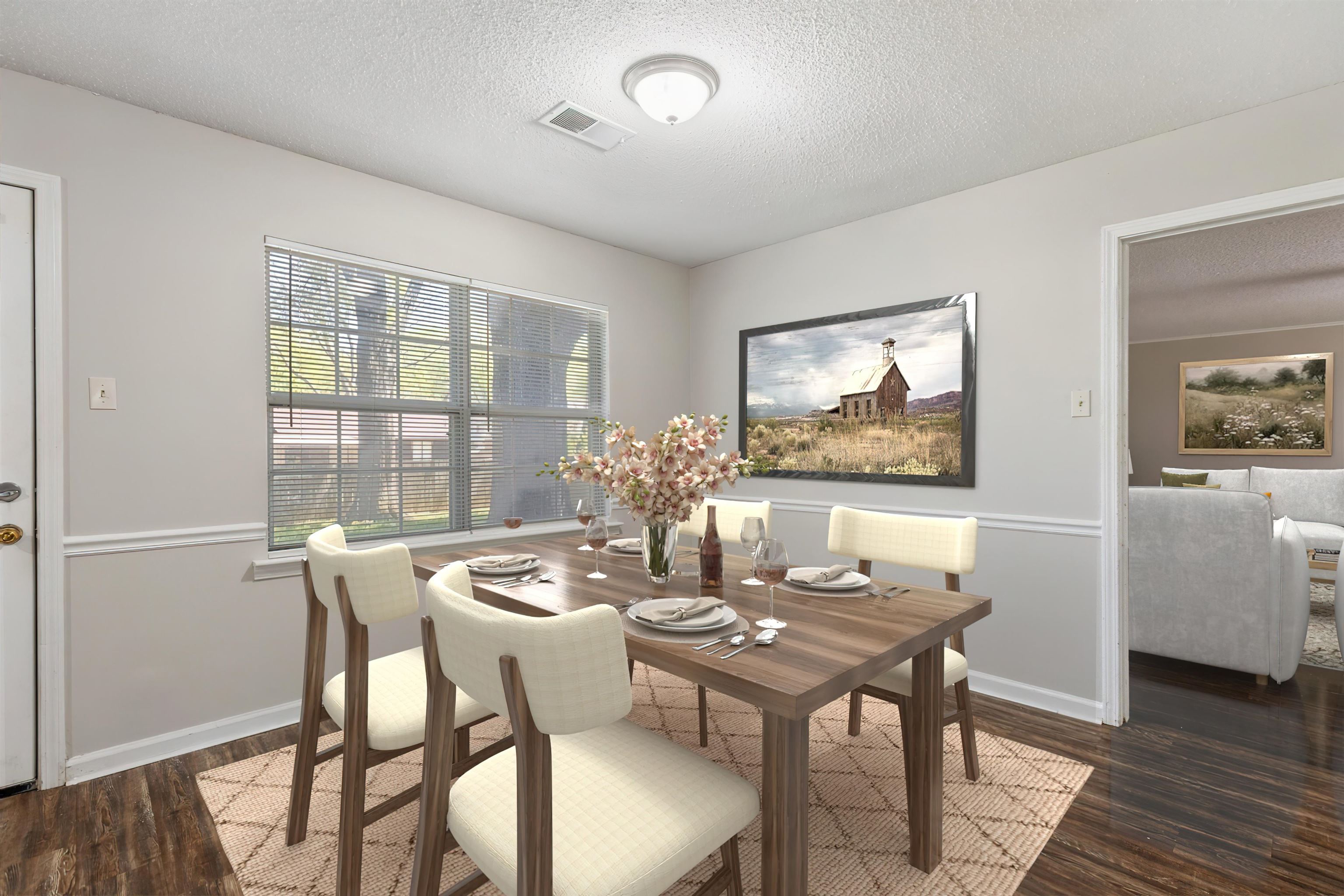4160 Luther Road Bartlett, TN 38135 - Photo 13 of 28 Dining room with baseboards, wood finished floors, visible vents, and a textured ceiling