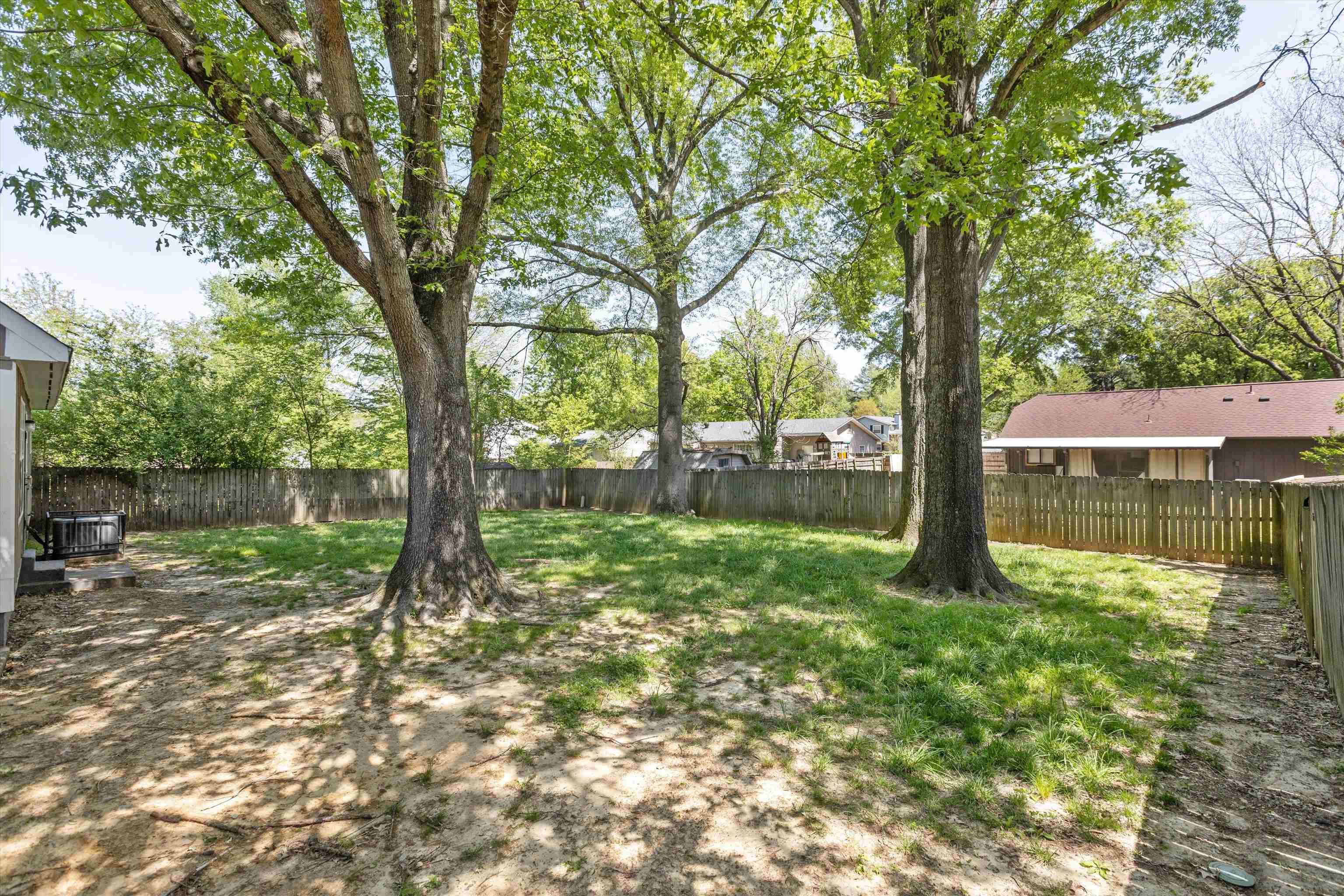 4160 Luther Road Bartlett, TN 38135 - Photo 25 of 28 View of yard with a fenced backyard and central AC unit