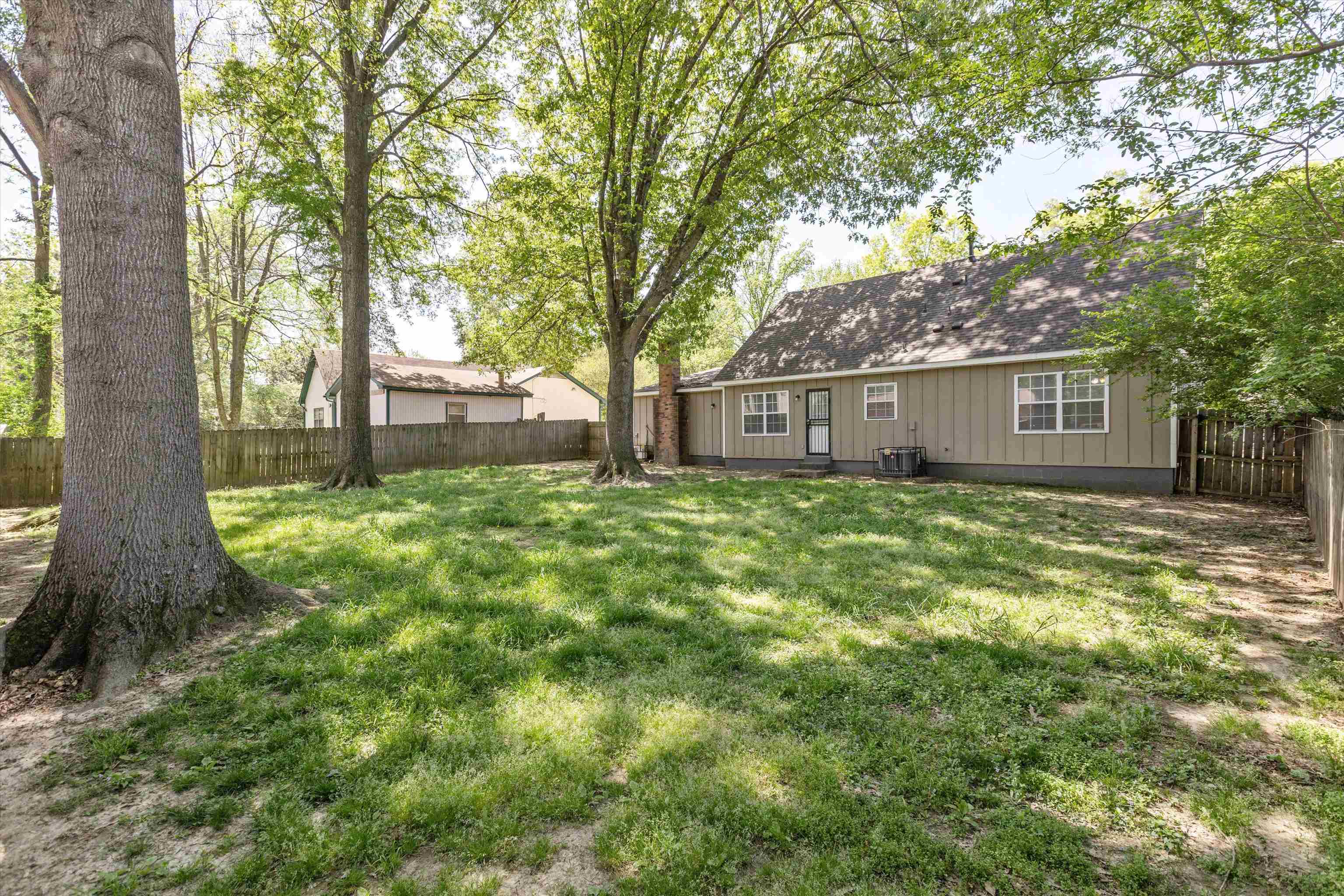 4160 Luther Road Bartlett, TN 38135 - Photo 26 of 28 View of yard featuring central air condition unit and a fenced backyard