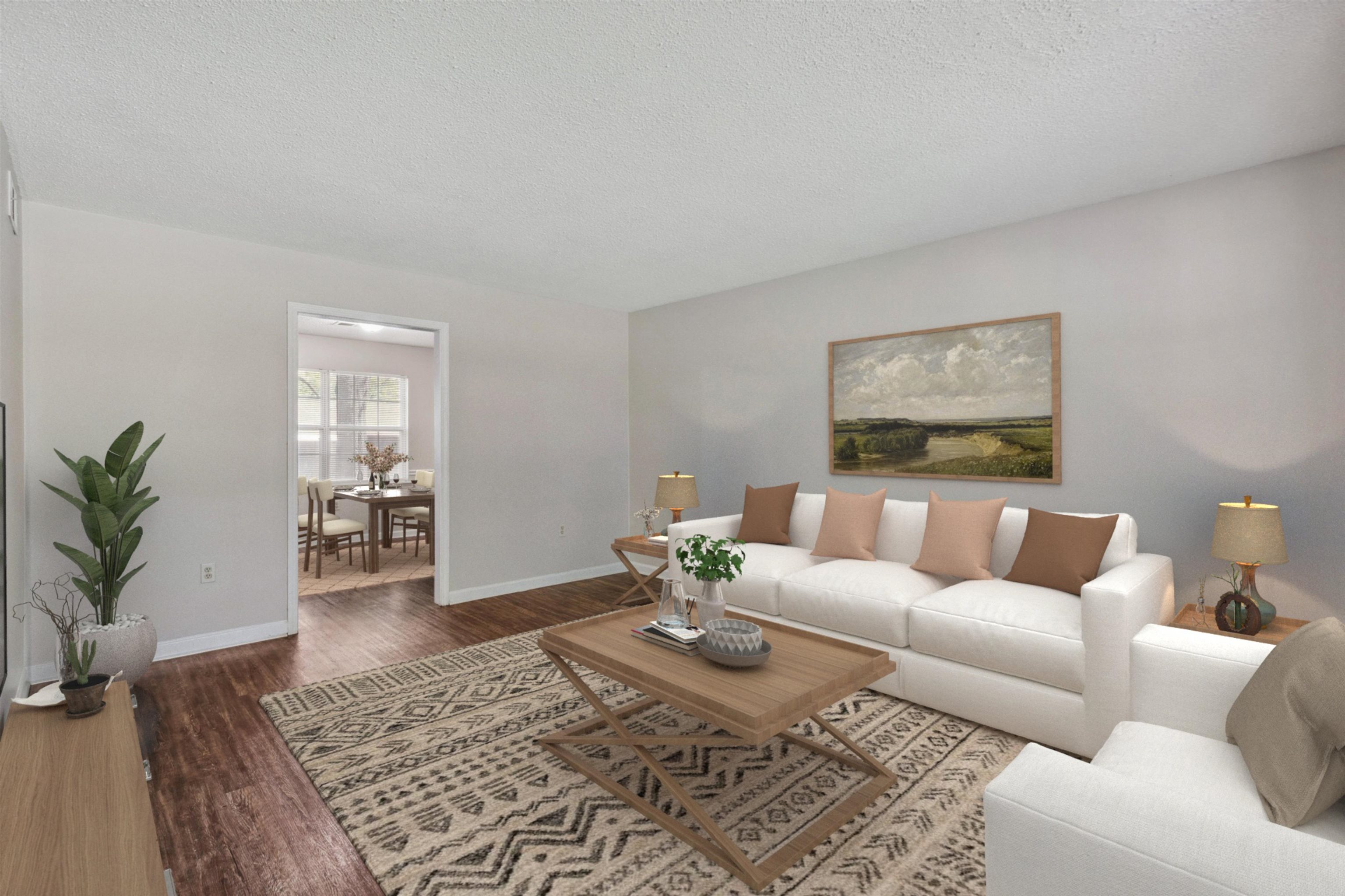 4160 Luther Road Bartlett, TN 38135 - Photo 6 of 28 Living area with baseboards, wood finished floors, and a textured ceiling