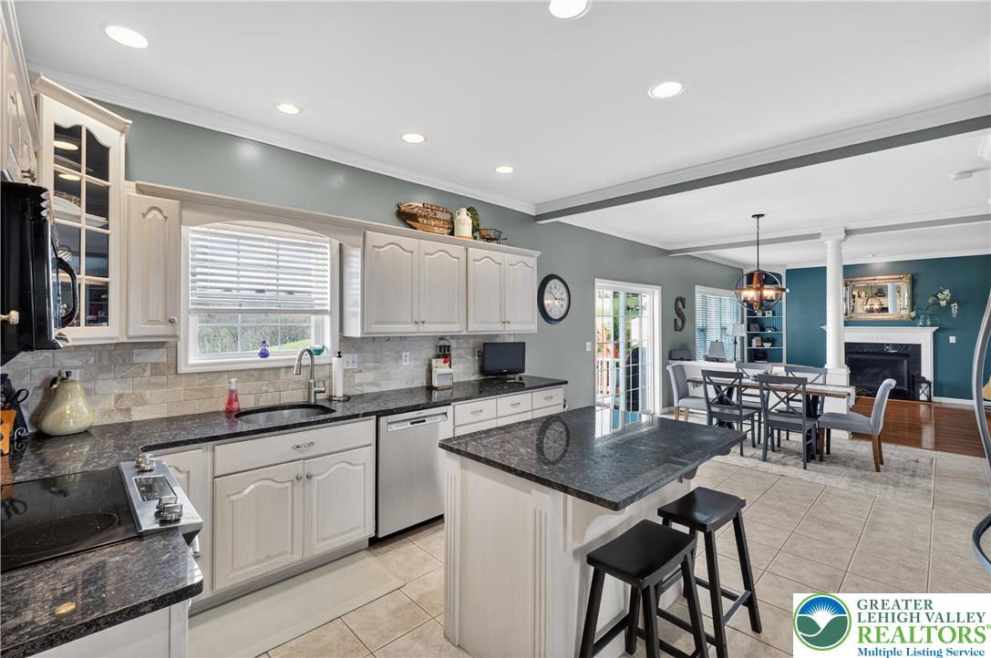 3110 Valley View Drive Bath, PA 18014 - Photo 11 of 64 a kitchen with a sink a counter top space stainless steel appliances and a window