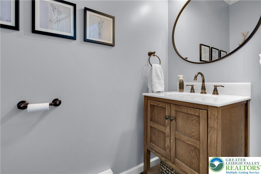 3110 Valley View Drive Bath, PA 18014 - Photo 16 of 64 a bathroom with a sink and mirror