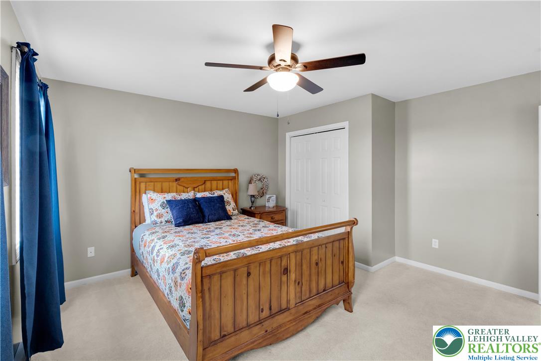 3110 Valley View Drive Bath, PA 18014 - Photo 19 of 64 a bedroom with a bed and ceiling fan