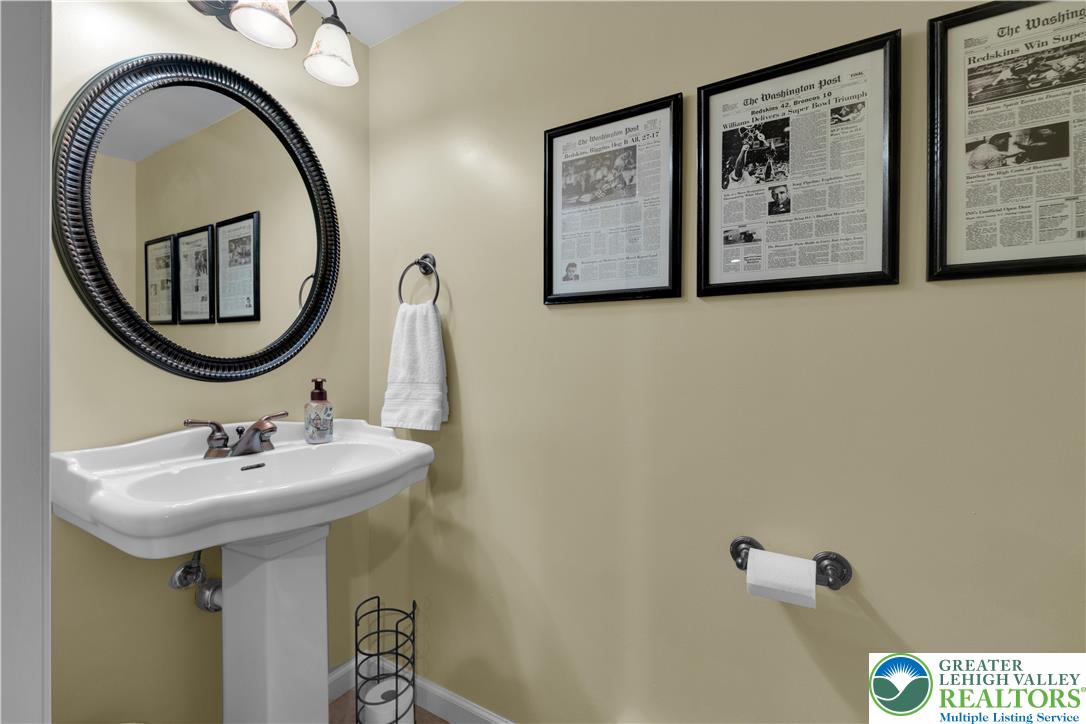 3110 Valley View Drive Bath, PA 18014 - Photo 30 of 64 a bathroom with a sink and a mirror