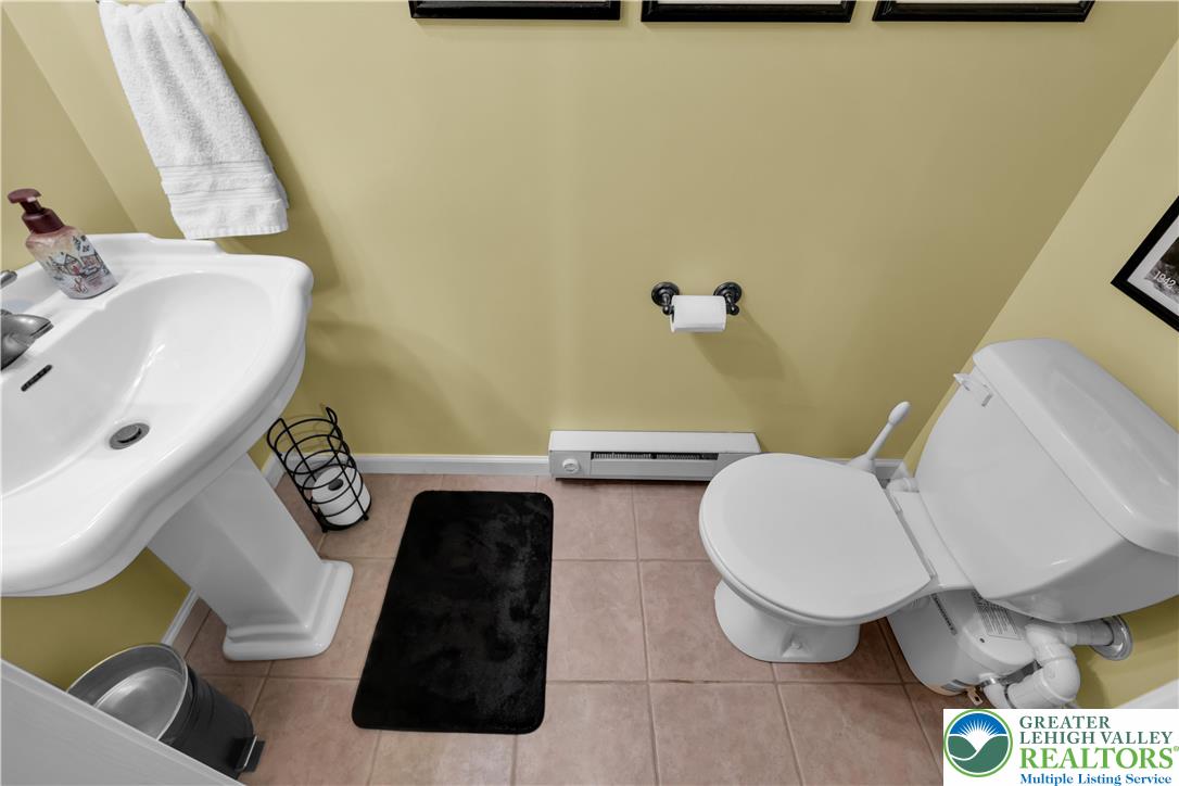 3110 Valley View Drive Bath, PA 18014 - Photo 31 of 64 a bathroom with a sink mirror vanity and toilet