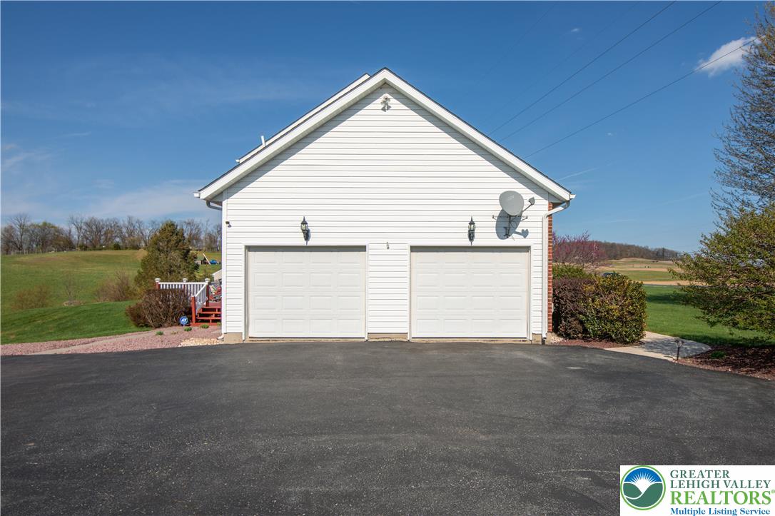 3110 Valley View Drive Bath, PA 18014 - Photo 4 of 64 a view of a house with a yard and garage