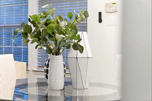 a vase of flowers sitting on a table