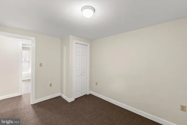 an empty room with a door