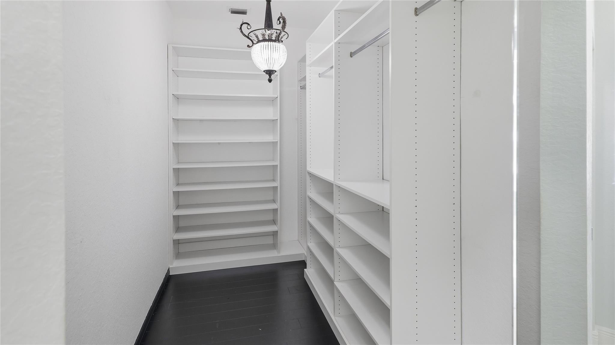 10141 Umberland Place Boca Raton, FL 33428 - Photo 16 of 26 a view of walk in closet with empty racks