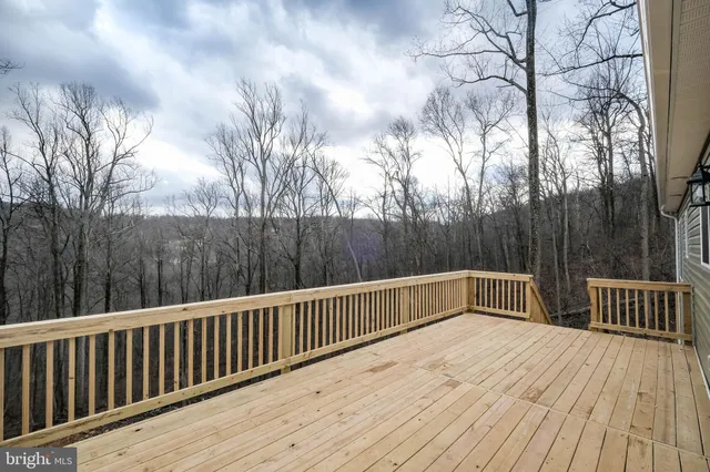 a kitchen with a sink stove and microwave