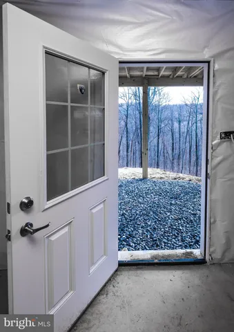 a view of a backyard of the house