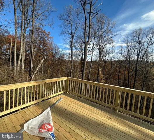 a view of house with yard