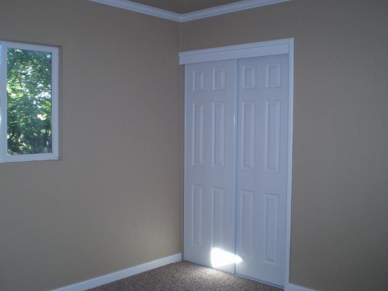 1013 Layton Road Redding, CA 96002 - Photo 15 of 15 a view of a small space with wooden floor and a window