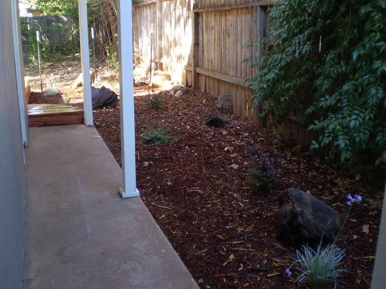 1013 Layton Road Redding, CA 96002 - Photo 4 of 15 a view of a back yard from a corridor