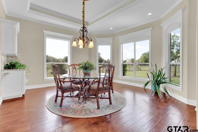 a bathroom with a double vanity sink mirror and shower