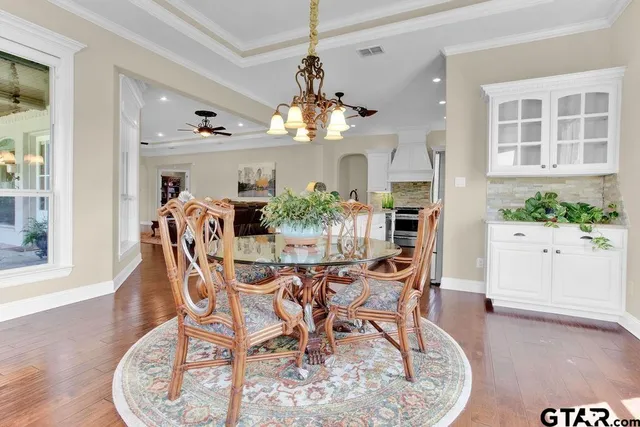a bathroom with a double vanity sink and mirror